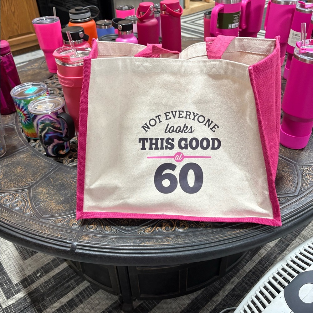 60th party gift bag with burlap and pink with saying on front. Bnnu. Display